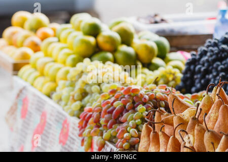 Different colorful fruit at market in Batumi, Agaria, Georgia Stock Photo