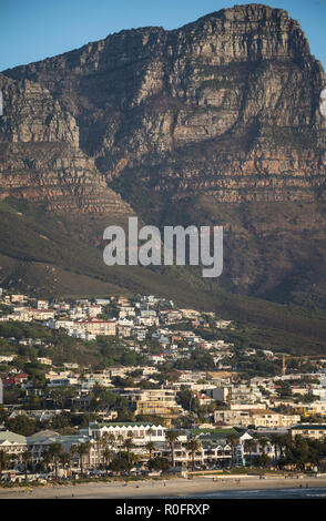 Camps Bay at sunset with background of Twelve Apostle mountains in Cape Town South Africa Stock Photo