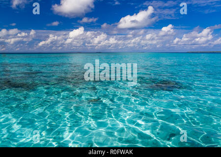 Tropical sea under the blue sky, clear water, tranquil nature ocean. Endless view, horizon of sea Stock Photo