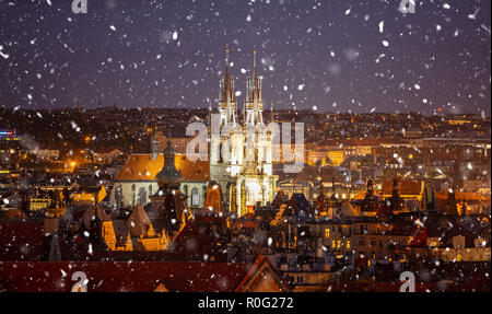 Church of Our Lady in Prague, aerial view at dusk, snowing with gloomy lights, Czech Republic Stock Photo