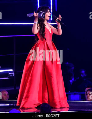 camila cabello havana red dress Camilla Cabello Steps Out in a Fuchsia Lace Gown as She Heads to Taylor Swift and Travis Kelce's N.Y.C. Wedding