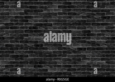 seamless old dark black brick wall infinity texture design pattern background Stock Photo