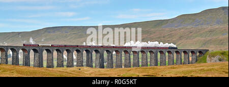 Preserved steam hauled train at Ribblehead Viaduct on the Settle & Carlisle Railway line, Yorkshire Dales National Park, Northern England, UK