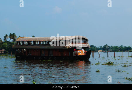 Beautiful alleppey house boats wading through backwaters of Kerala Stock Photo