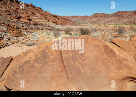 Twyfelfontein Namibia; ancient bushman rock engravings at the UNESCO World heritage site, Twyfelfontein, Damaraland, Namibia Africa Stock Photo