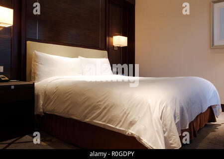 Standard king size beds hotel room Stock Photo