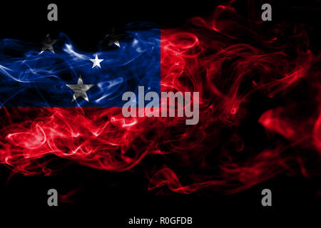 National flag of Samoa made from colored smoke isolated on black background. Abstract silky wave background Stock Photo