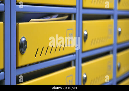 metal mailboxes in an apartment building. Cool mailboxes Stock Photo