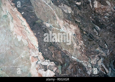 Multicolored layered marble texture with different veins and scratches, may be used as background Stock Photo