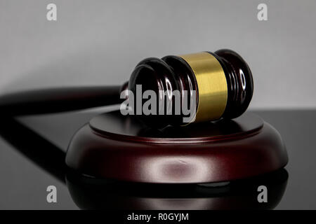 Judge's gavel on gray background