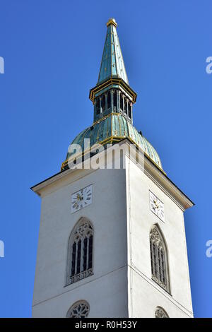 Gothic spire of Roman Catholic cathedral of St Martin in Bratislava dominates skyline of Old Town. Stock Photo