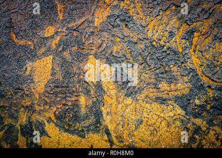 Black with brown bumpy wall stucco texture background. Decorative wall paint Stock Photo