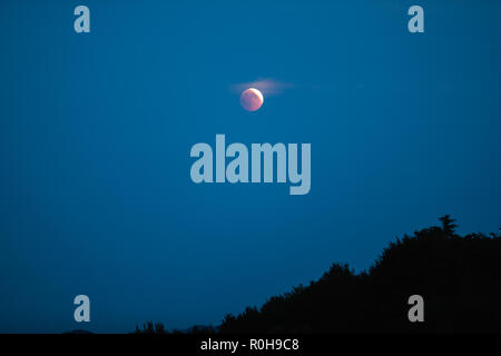 Total Lunar Eclipse on July 27, 2018 from Bologna Italy Stock Photo