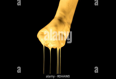 Human palms dipped in color paint. Painted hands. Liquid drips off ...