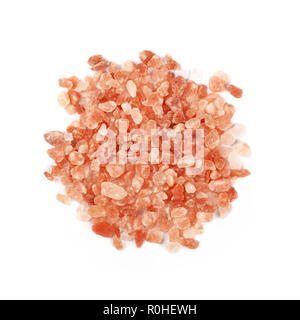 Close up one portion, heap of large crystals pink Himalayan salt isolated on white background, elevated top view, directly above Stock Photo