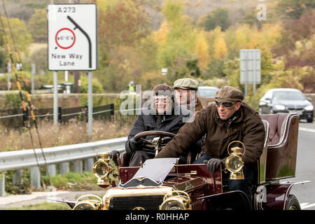 Pyecombe, East Sussex, UK. 4th November 2018. Christian Horner of Red Bull racing with Lord Laidlaw in the Lords 1904 Panhard-Levassor as they join owners and drivers take for the 79th  “Bonham's” London to Brighton Veteran car run. The 60 mile route, starting in Hyde Park London concludes at Madeira Drive Brighton. The vehicles in this year annual event, including an 1895 Peugeot and an 1898 Panhard et Levassor were all built between 1893 and 1905.