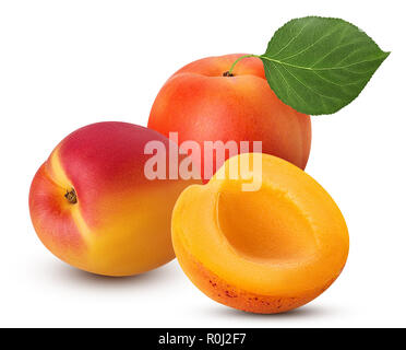 Two fresh ripe apricot with leaf one cut in half isolated on white background. Clipping Path. Full depth of field. Stock Photo