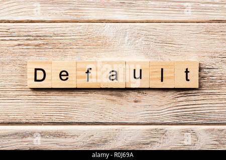 default word written on wood block. default text on table, concept. Stock Photo