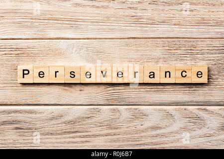 perseverance word written on wood block. perseverance text on table, concept. Stock Photo