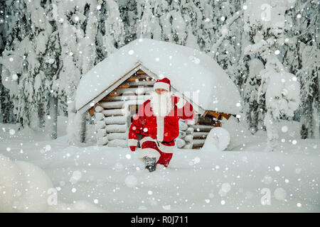 Authentic Santa Claus in Lapland. Magnificent snow-covered landscape. Stock Photo