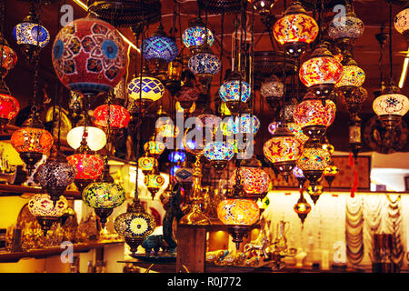Traditional handmade turkish lamps in souvenir shop. Mosaic of colored glass. Grand bazaar, Istanbul, Turkey. Stock Photo