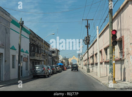 street with houses and shops in downtown merida, mexico. Stock Photo