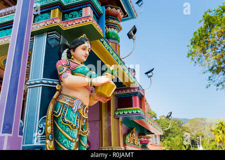 Waterfall hilltop Arulmigu Balathandayuthapani temple on Penang island in Malaysia. Sacre hinduism architecture. Stock Photo