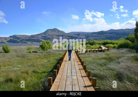 Walking on boardwalk at Puerto Ingeniero Ibañez, Lago Gral Carrera, Chile Stock Photo