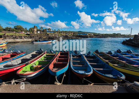 Wooden fishing boats in the natural port of Hanga Roa Stock Photo