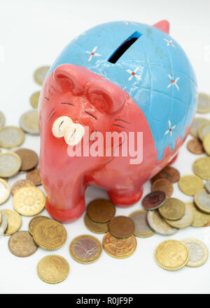 Colorful cute ceramic elephant piggy bank cut out isolated on white background