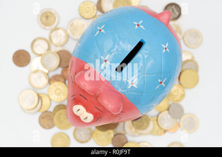 Colorful cute ceramic elephant piggy bank cut out isolated on white background Stock Photo