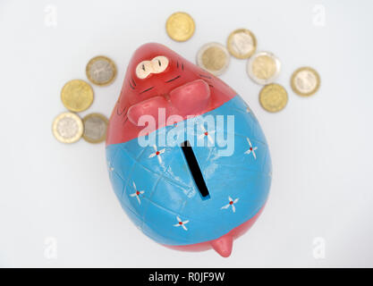 Colorful cute ceramic elephant piggy bank cut out isolated on white background