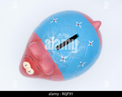 Colorful cute ceramic elephant piggy bank cut out isolated on white background