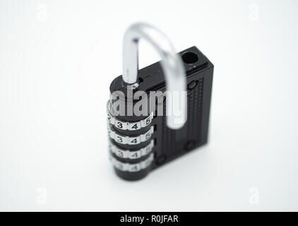 Black code number padlock open and isolated on white background Stock Photo