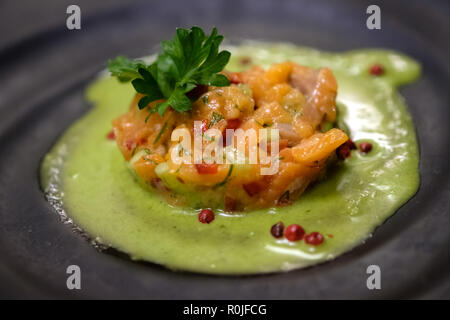 Salmon cheviche dish at a fancy gourmet restaurant Stock Photo