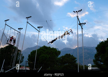 Flying trapeze school with circus activities at the Club Med Palmiye luxury all inclusive resort, Kemer, Antalya, Turkey Stock Photo