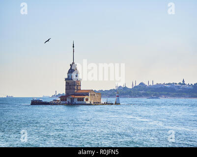 The Maiden's Tower at the Bosphorus, with The Hagia Sophia Mosque and The Sultan Ahmet Mosque in the background. Istanbul, Turkey. Stock Photo