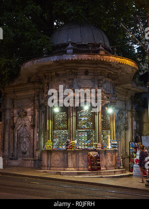 A historic Sebil or Sabil, a typical small kiosk, in the Alemdar street, Fatih district, at night. Istanbul, Turkey. Stock Photo