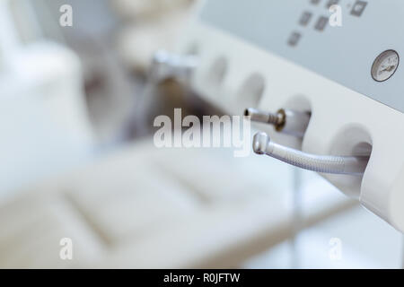 Different dental instruments and tools in a dentists office close up background Stock Photo