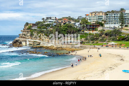 Bondi to Coogee coastal walk Bronte Beach and dwellings on sandstone cliff over Pacific Ocean Sydney NSW Australia. Stock Photo