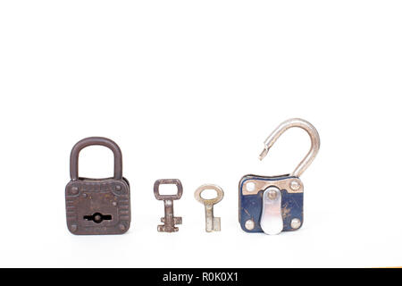 Open and closed vintage padlocks and keys isolated on white background. Front view Stock Photo