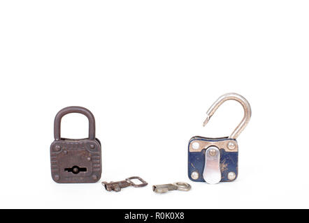 Open and closed vintage padlocks and keys isolated on white background. Front view Stock Photo