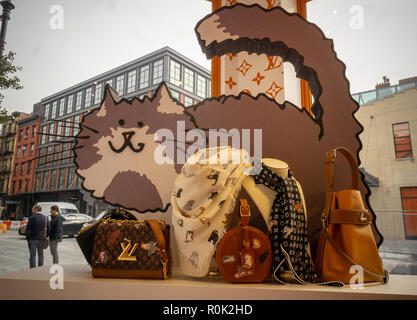 A cat-themed collaboration between he Louis Vuitton and fashion editor Grace Coddington opens a pop-up store in the trendy Meatpacking District in New York on Friday, October 26, 2018. Featuring Coddington's illustrations of her cats, the collection is named Catogram and the felines appear all over the leather goods, clothing shoes and even pajamas. (Â© Richard B. Levine) Stock Photo