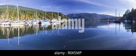 Wide Panoramic Scenic Landscape View of Indian Arm and Moored Yachts in Deep Cove Marina, Vancouver North Shore British Columbia Canada Stock Photo