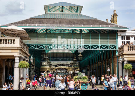 London England,UK,Covent Garden,market,shopping dining entertainment,Apple Market,central hall building,Charles Fowler,neo-classical,1830,crowded,fami Stock Photo