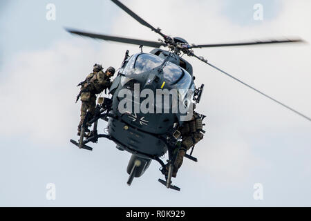 German Special Forces attached to an Airbus H145M helicopter. Stock Photo