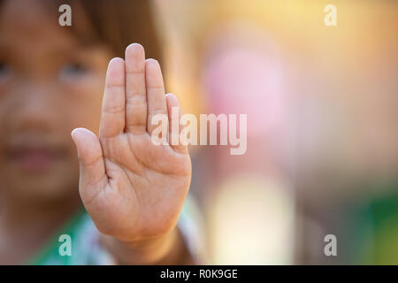 Stop harassment child and stop violence abuse in child. Hand stop no. Stock Photo
