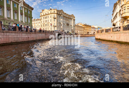 19 September 2018: St Petersburg, Russia - Some of the grand old buildings which line the canals of the city, taken from one of the canal boats. Stock Photo