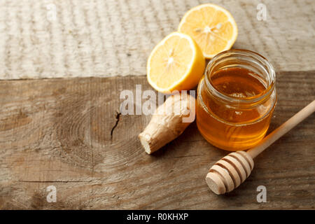 ingredients for making immunity boosting healthy vitamin drink on vintage wooden background Stock Photo