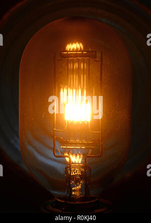 close up lightbulb filament glowing when switched on Stock Photo